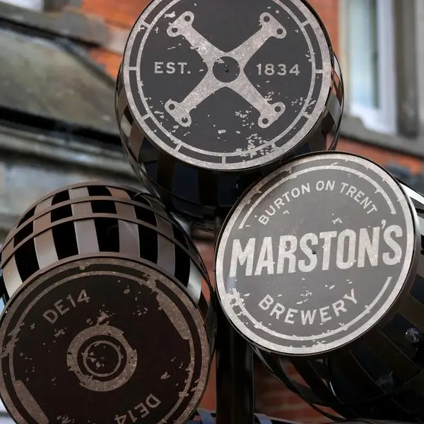 UK pub operator Marston's upbeat on current sales after annual profit miss