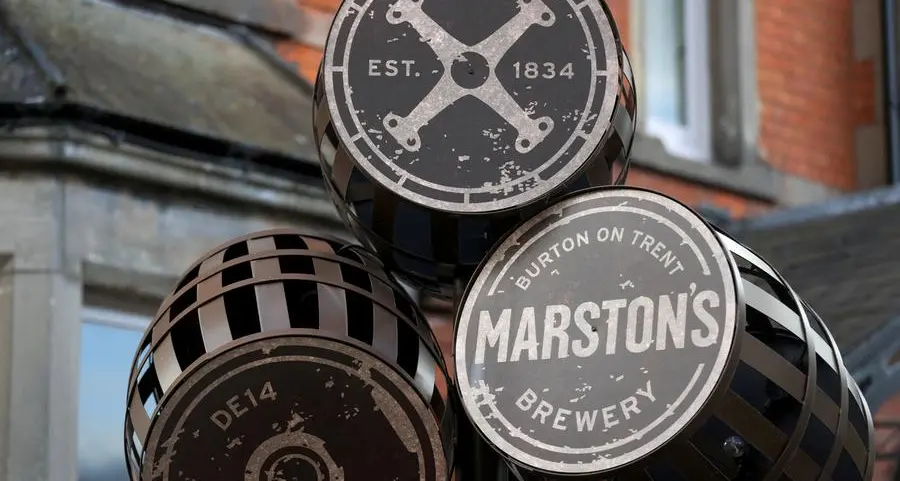 UK pub operator Marston's upbeat on current sales after annual profit miss