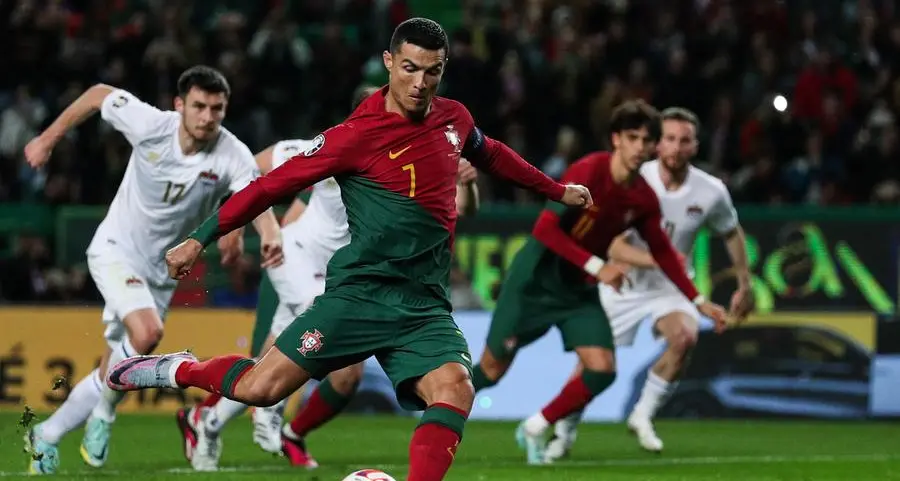 Ronaldo breaks men's international caps record, scores double