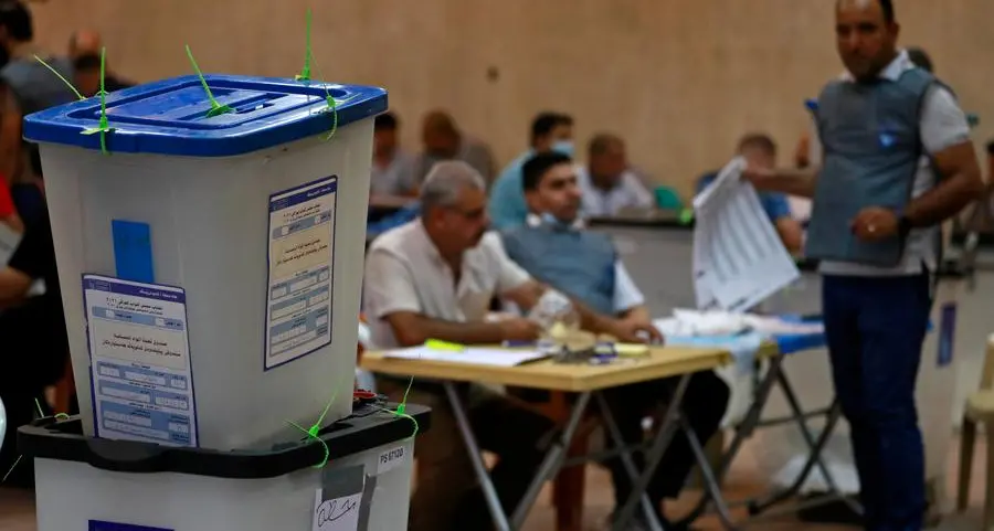 Iraq changes electoral law, sparking opposition anger