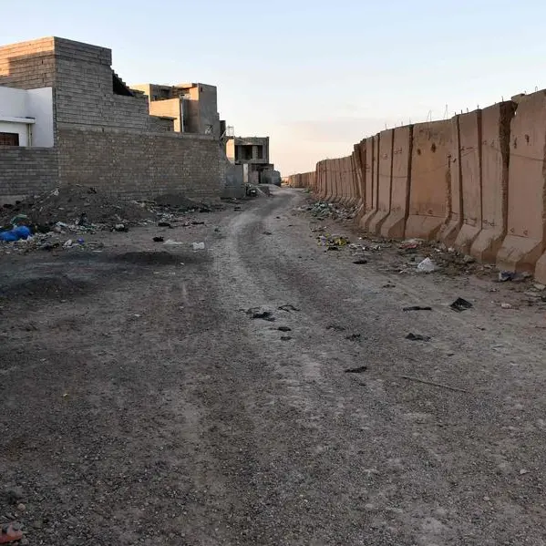 Years after civil war, security wall holds back Iraqi city