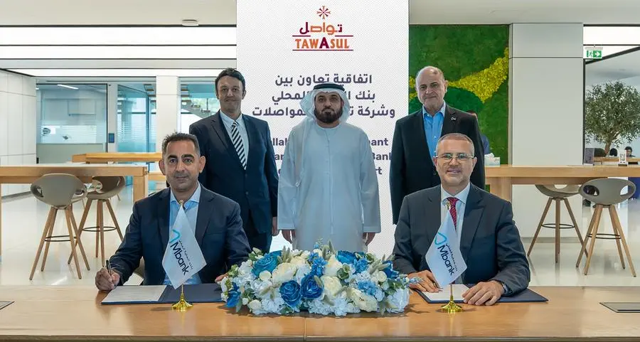 Tawasul Transport and Al Maryah Community Bank launch the first digital payment system in taxis using AE Coin