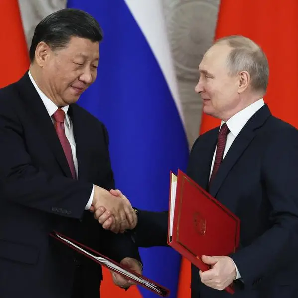 Xi urges Shanghai alliance solidarity, Putin praises support