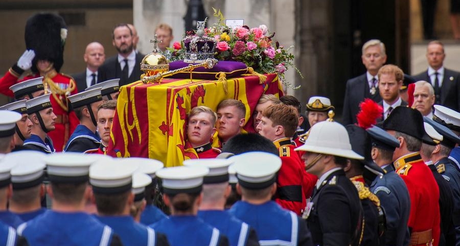 Queen Elizabeth's coffin makes way to abbey ahead of funeral