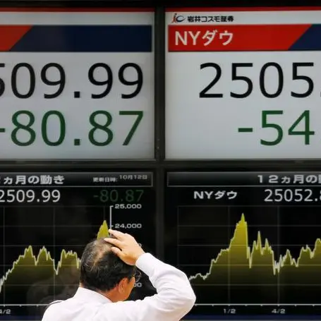 Nikkei inches down as investors pause rally, posts 6th straight monthly gain