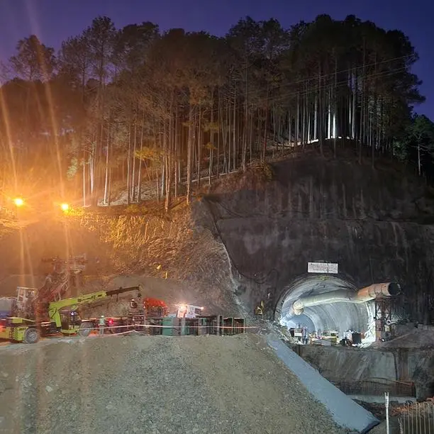 Rescuers drill to send more food to trapped workers in Indian tunnel