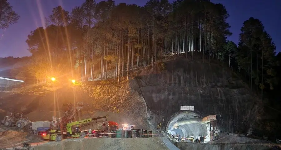 Rescuers drill to send more food to trapped workers in Indian tunnel