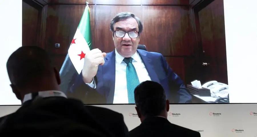 Syria's growth accelerates as sanctions ease, refugees return, central bank chief says