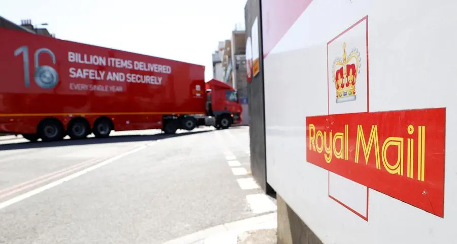 Royal Mail parent IDS posts smaller annual loss on turnaround headway