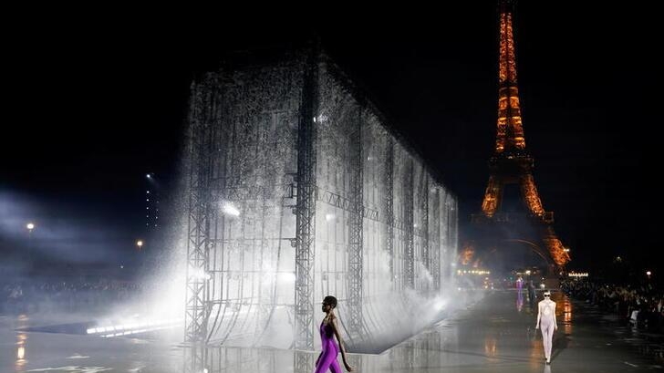 Under a cloud of belt-tightening, Paris Fashion Week struts on
