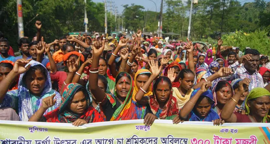 Bangladesh garment workers clash with police as factories reopen