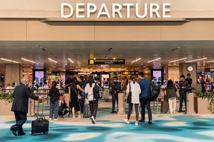 Rare delays at Singapore airport due to immigration system issues
