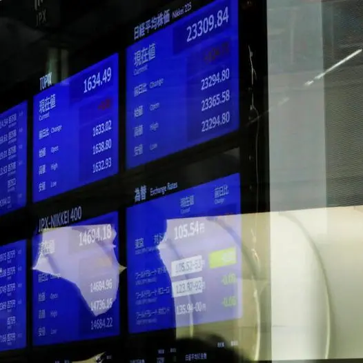 Japan shares edge up as stimulus cheer lifts cyclicals, SoftBank drags