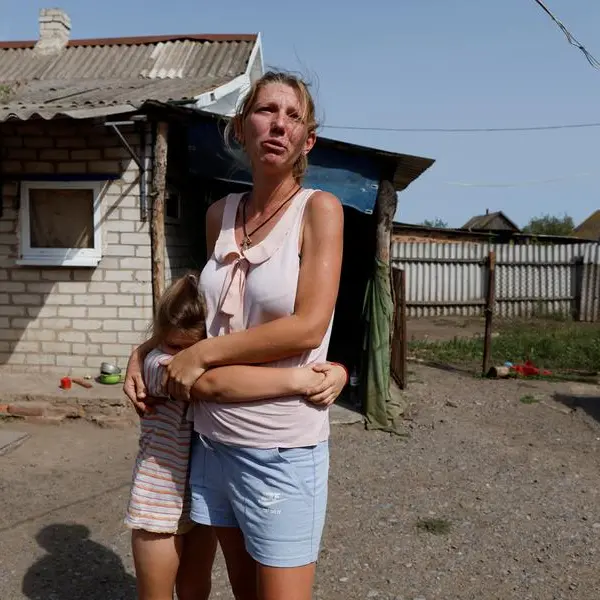 Despite shelling, family life goes on in cellar in eastern Ukraine