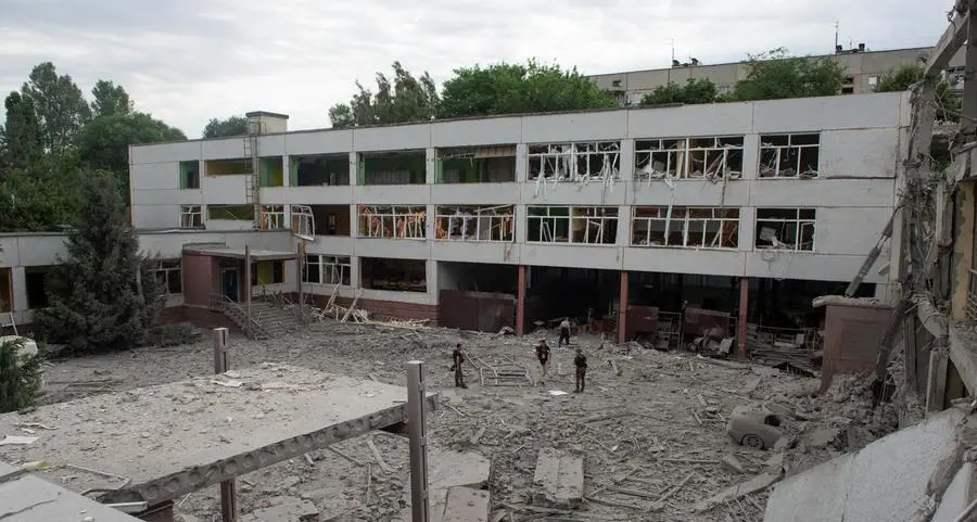 Dozens feared trapped after Russian strike on Ukraine apartment building