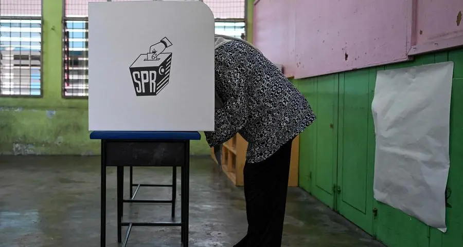 Malaysians vote in six states in polls seen as referendum on Anwar