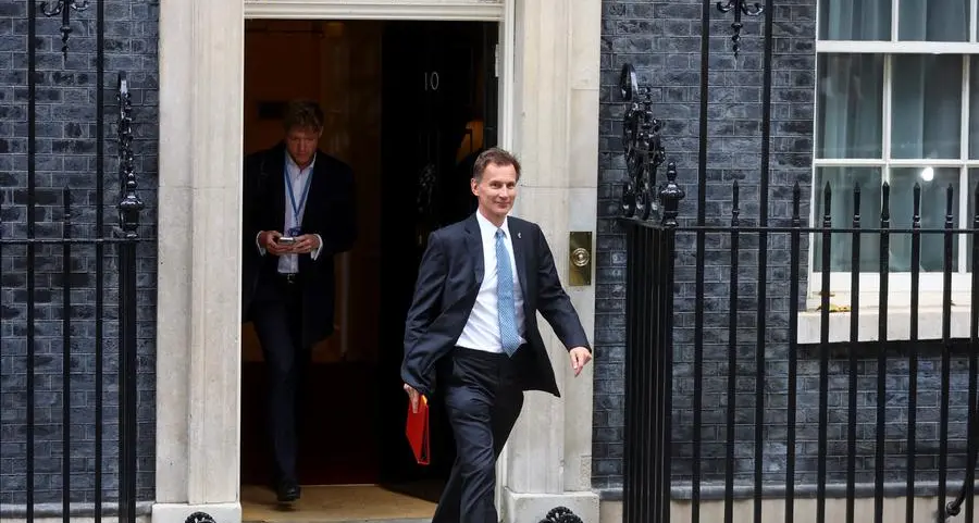 UK's Hunt says he has to raise taxes to fix economy
