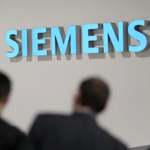 UPDATE 1-Siemens signs energy deals with Iran's Mapna Group