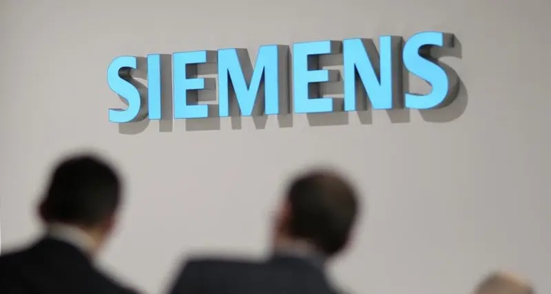 UPDATE 1-Siemens signs energy deals with Iran's Mapna Group