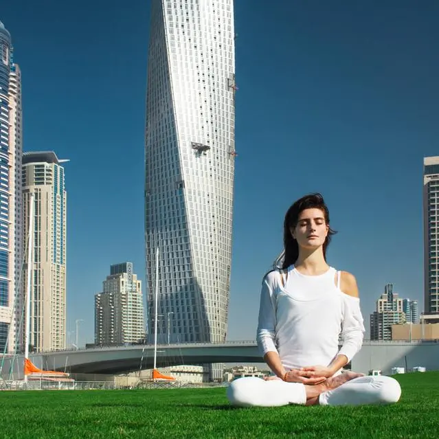 Over 250 Dubai residents come together to do yoga on board historic Navy ship