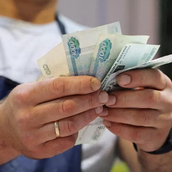 Russian rouble falls to near one-week low versus dollar