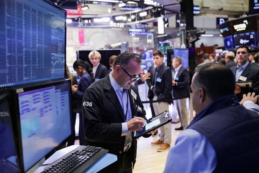 US Stocks: Wall St ends lower as bank CEOs warn of possible pullback, fueling tech bubble jitters