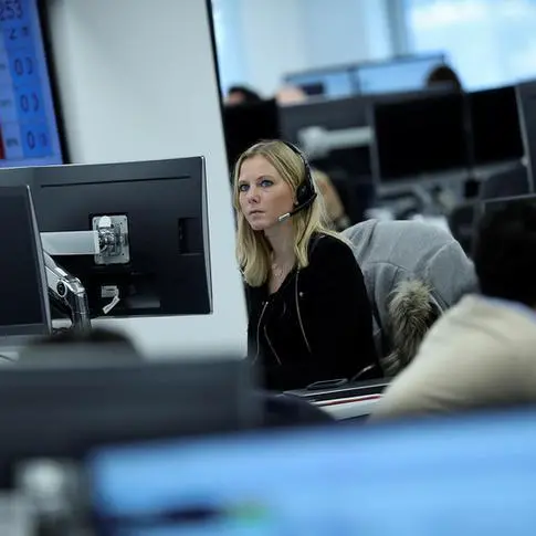 UK stocks edge higher, National Express jumps on contract win