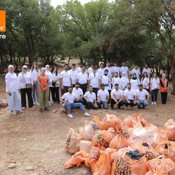 Orange Jordan employees volunteer on World Cleanup Day in a cleanup campaign at Ishtafina Forest in Ajloun