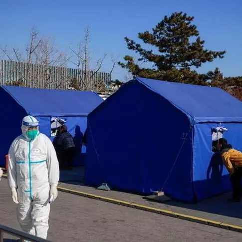 China reports more than 100 new COVID cases as New Year holiday exodus looms