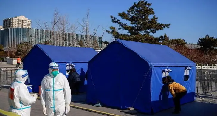 China reports more than 100 new COVID cases as New Year holiday exodus looms