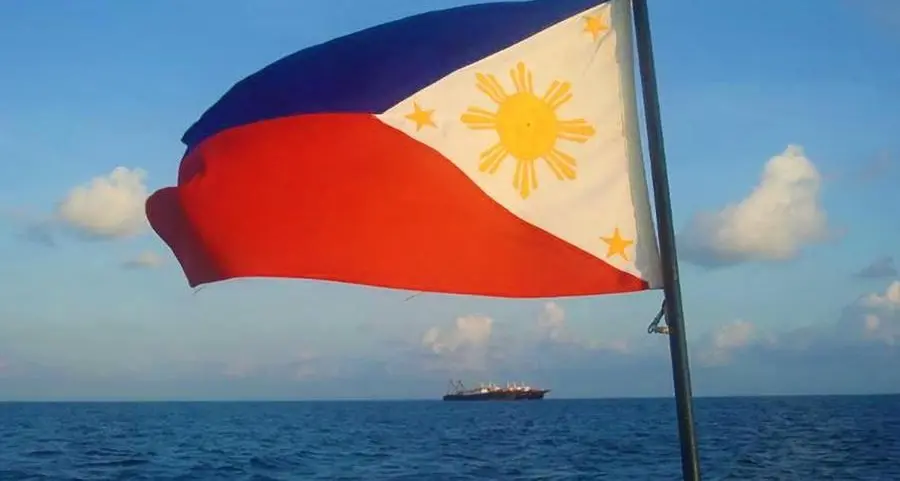 Philippines vows removal of Chinese barriers at disputed reef
