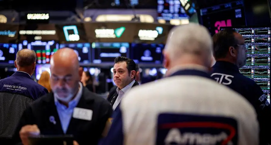 Stocks slide in reality check from big cap earnings; dollar firm