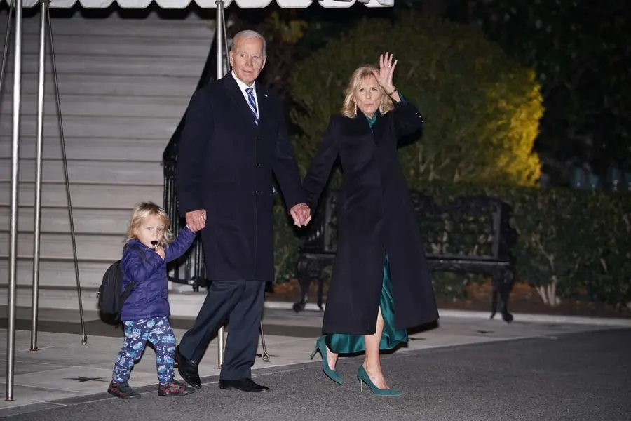 US President Joe Biden and First Lady Jill Biden with grandson Beau Biden Jr., make their way to board Marine One from the South Lawn of the White House in Washington, DC on December 16, 2022. - Biden is heading to Wilmington, Delaware where he is scheduled to spend the weekend at his residence. (Photo by Mandel NGAN / AFP) , Agence France-Presse (AFP)/AFP