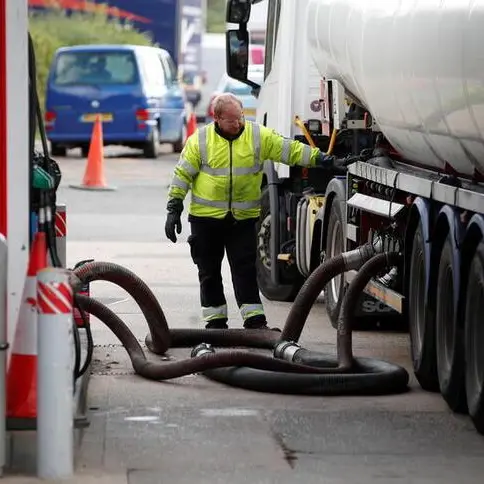 Britain says fuel crisis under control, but some gas pumps still empty