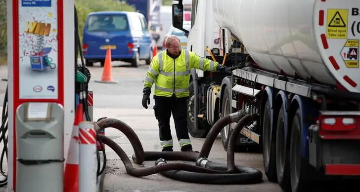 Britain says fuel crisis under control, but some gas pumps still empty