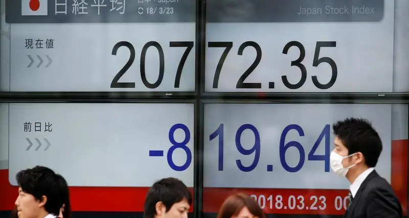 Nikkei ends at 34-year high on tech gains, weaker yen