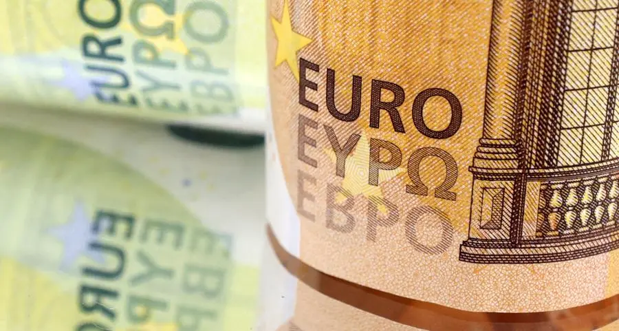 Euro slips after inflation data, concerns over German politics