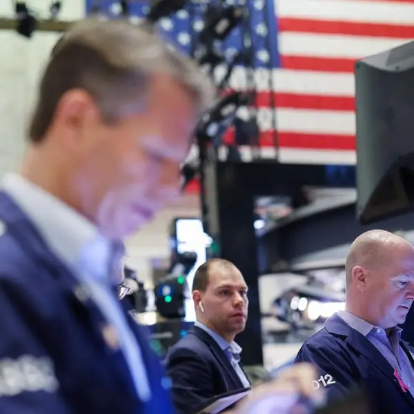 Stocks firm, dollar retreats ahead of Fed decision