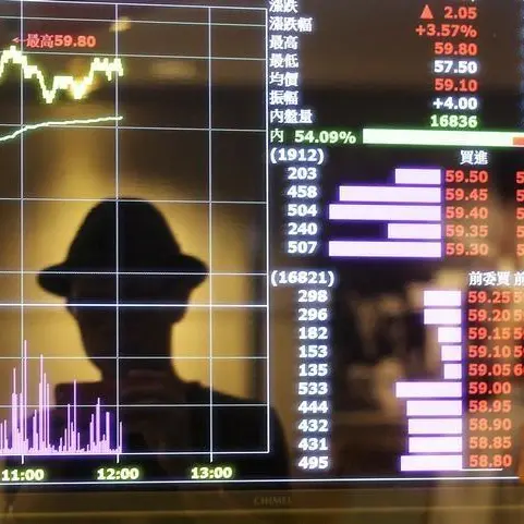 Taiwan seeks to reassure on economy as stocks fall amid COVID-19 spike