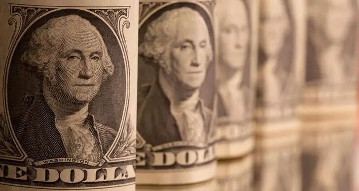 Dollar rebounds, traders seek clarity on US rate path