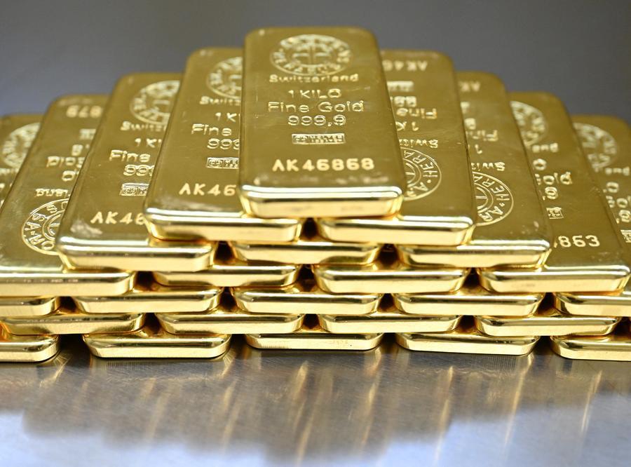 Gold gains as soft US data pressures dollar, fuels rate-cut bets