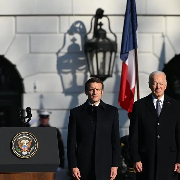 Biden greets Macron at White House under trade dispute cloud