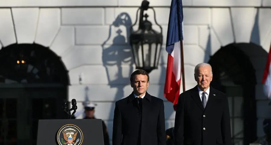 Biden greets Macron at White House under trade dispute cloud