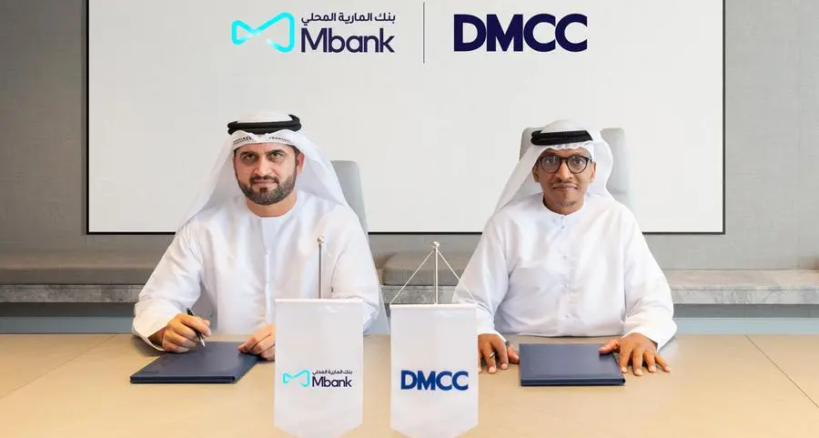 Al Maryah Community Bank signs an MoU with Dubai Multi Commodities Centre