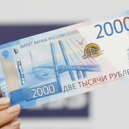 Rouble hovers near 80 vs dollar, stocks down