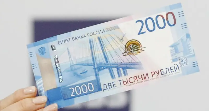 Rouble hovers near 80 vs dollar, stocks down