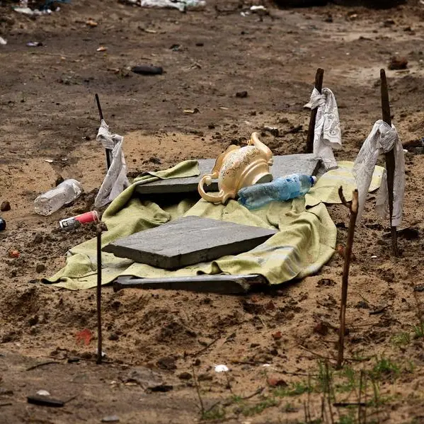 Village leader and family found buried in shallow grave outside Ukrainian capital
