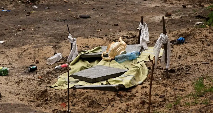 Village leader and family found buried in shallow grave outside Ukrainian capital