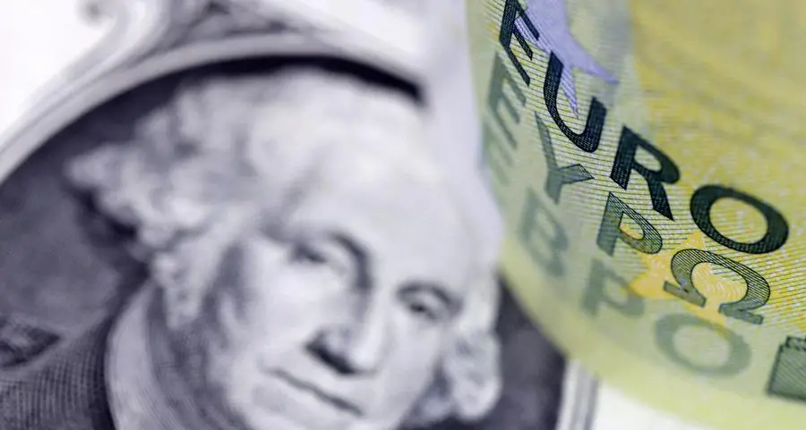 Dollar slips near seven-month lows after jobs data
