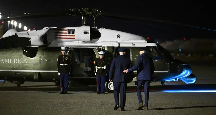 Biden visits Ohio village polluted by train wreck one year on